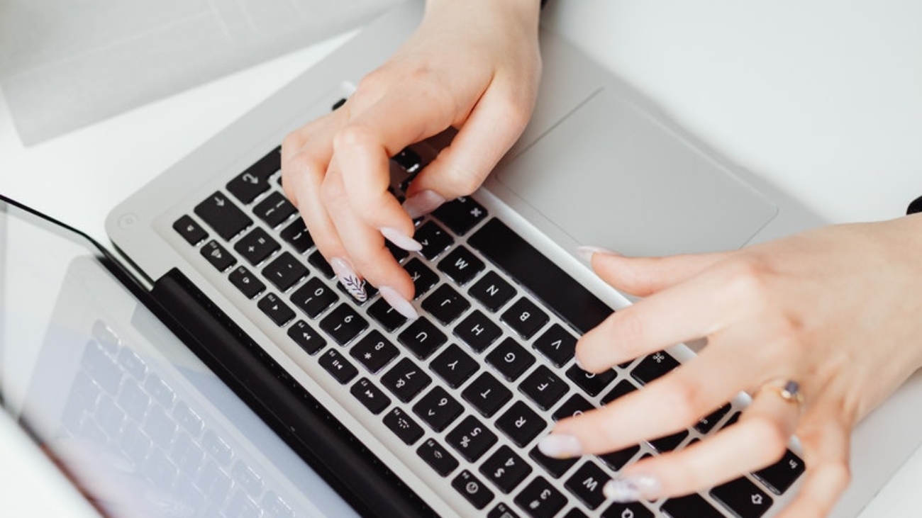 Person Using Black and Silver Laptop Computer