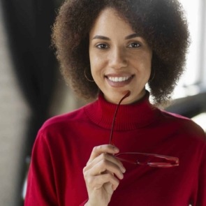 african-american-elegant-pretty-woman-in-casual-clothes-holding-stylish-trendy-red-spectacles.jpg